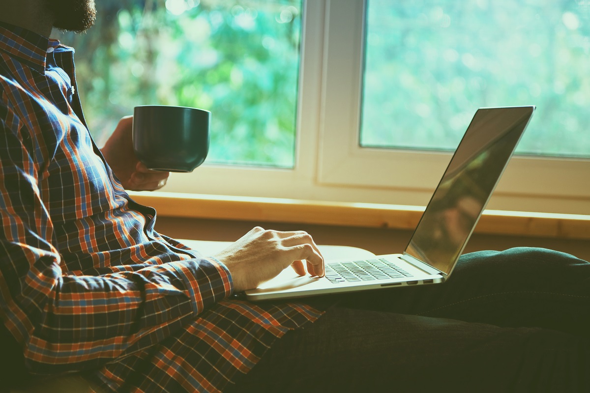 Drinking Tea on Laptop